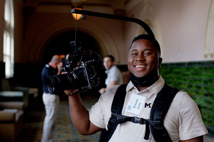Modi Camera Operator Smiling