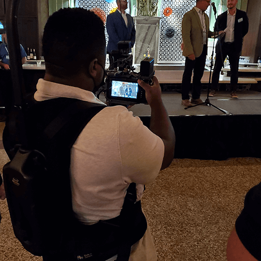 Camera Operator filming presentation